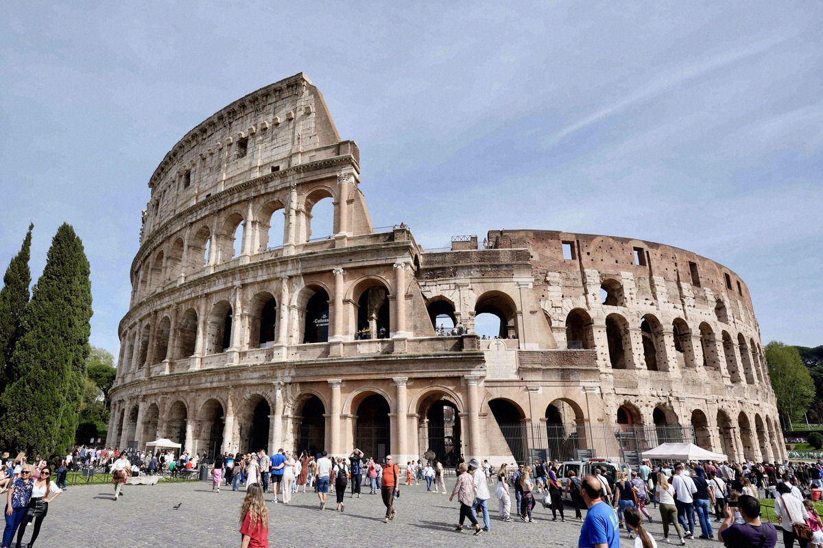 The outer wall of the Colosseum in Rome with its three rows of arches.